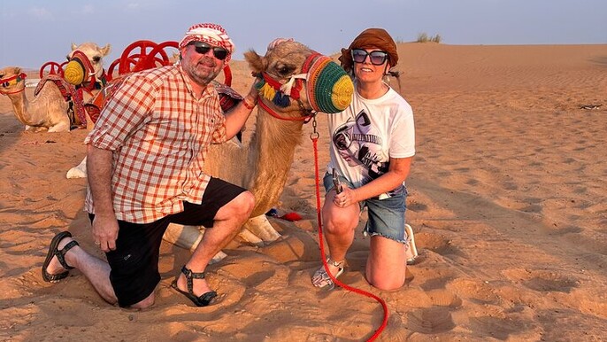 Exclusive Desert Safari Camel Ride Sandboard & Buffet BBQ Dinner