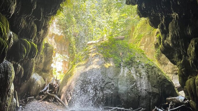 Cave Waterfall and Beach Exploration with Food Stop San Juan