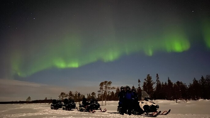 Arctic evening snowmobile tour | private group
