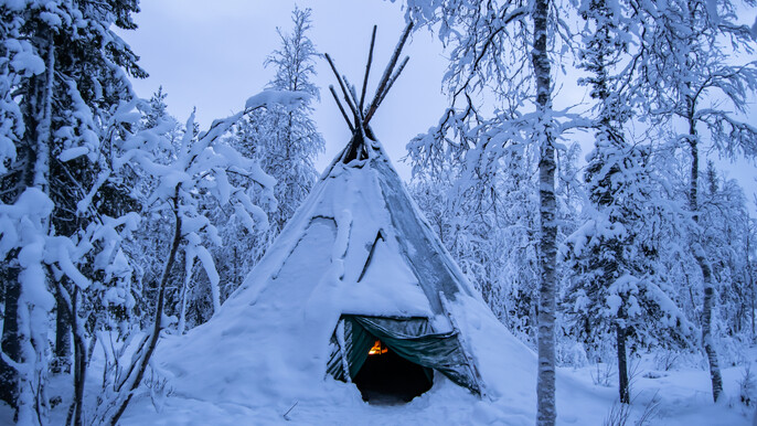 Lapp tent safari by snowmobile