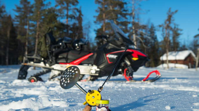 Snowmobile safari with ice fishing to Kivijärvi wilderness lake (100km)