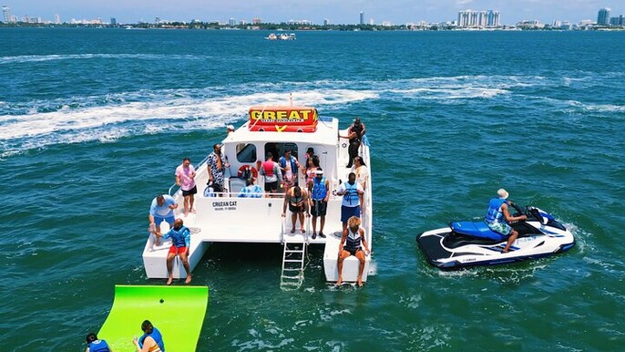 Aquatic Adventure: Boat Tour with Jetskis, Tubing, and Open Bar