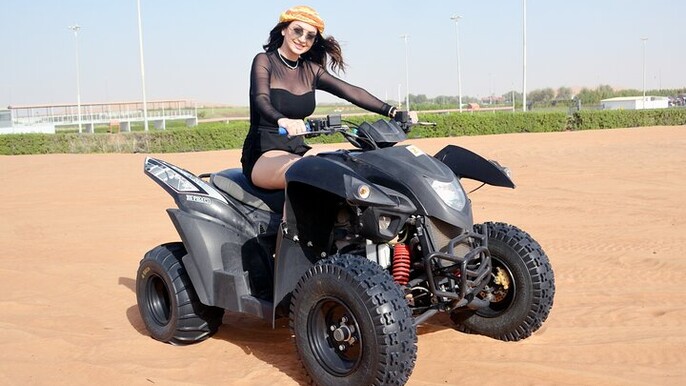 Sunset Desert Safari Quad bike Camel ride Sand Board & BBQ Dinner