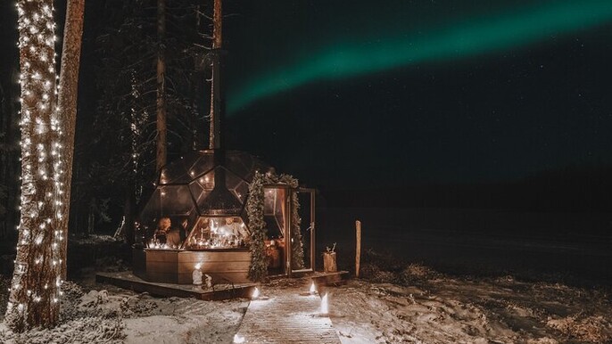 Northern Lights dinner in a Glass Igloo