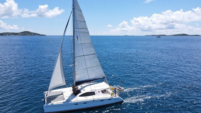 Private 6 Hrs 47 ft. Catamaran Snorkel & Cielo Charter (30p. max)