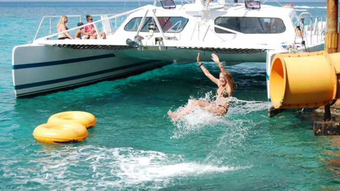 Reggae Catamaran & Snorkeling Open‑Bar Cruise (Montego Bay) – reef snorkeling, DJ, appetizers, unlimited drinks from Montego Bay Area