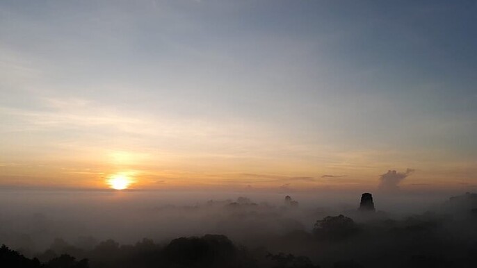 From Flowers Sunrise in Tikal and Sunset in Yaxha in a day