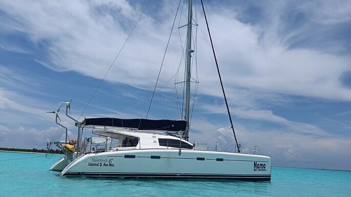 Private 6 Hrs 47 ft. Catamaran Snorkel & Cielo Charter (30p. max)